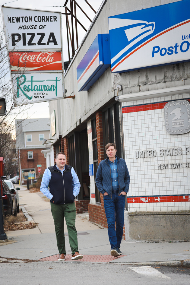 Photo of Ryan Gorman and Brian Iammartino walking down a sidewalk, towards the camera